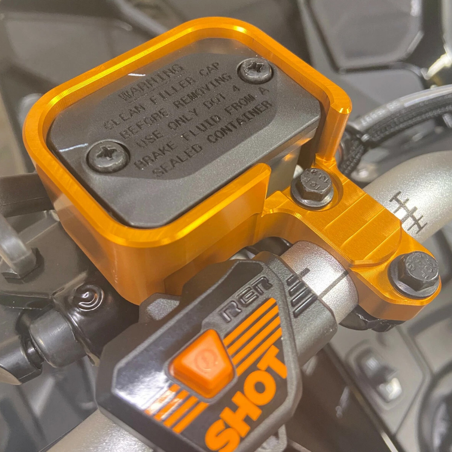 Ski-doo-lynx-gen-5-brake-reservoir-guard-orange-anodized